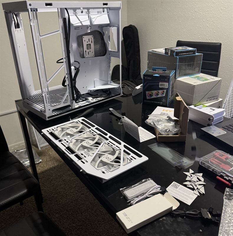 Gaming PC and laptop with RGB lighting being repaired